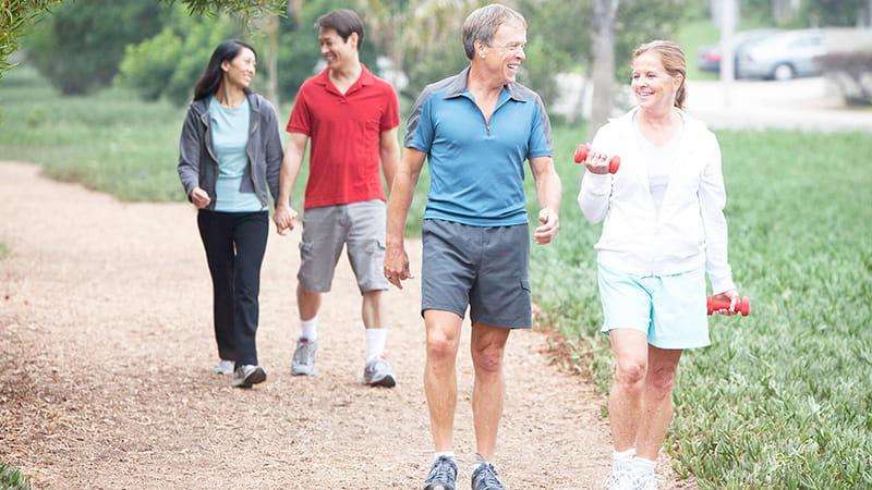 adult friends walking outdoors